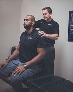 Dr. Dawes working on an athletic chiropractic patient